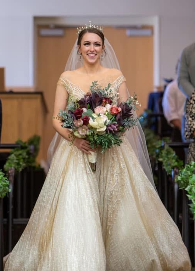 Caitlyn in her wedding dress